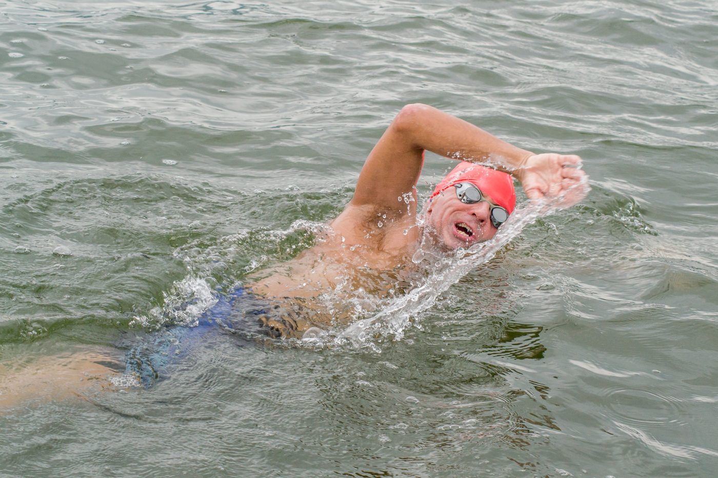 SWIMMING ACROSS LAKE BOSOMTWE