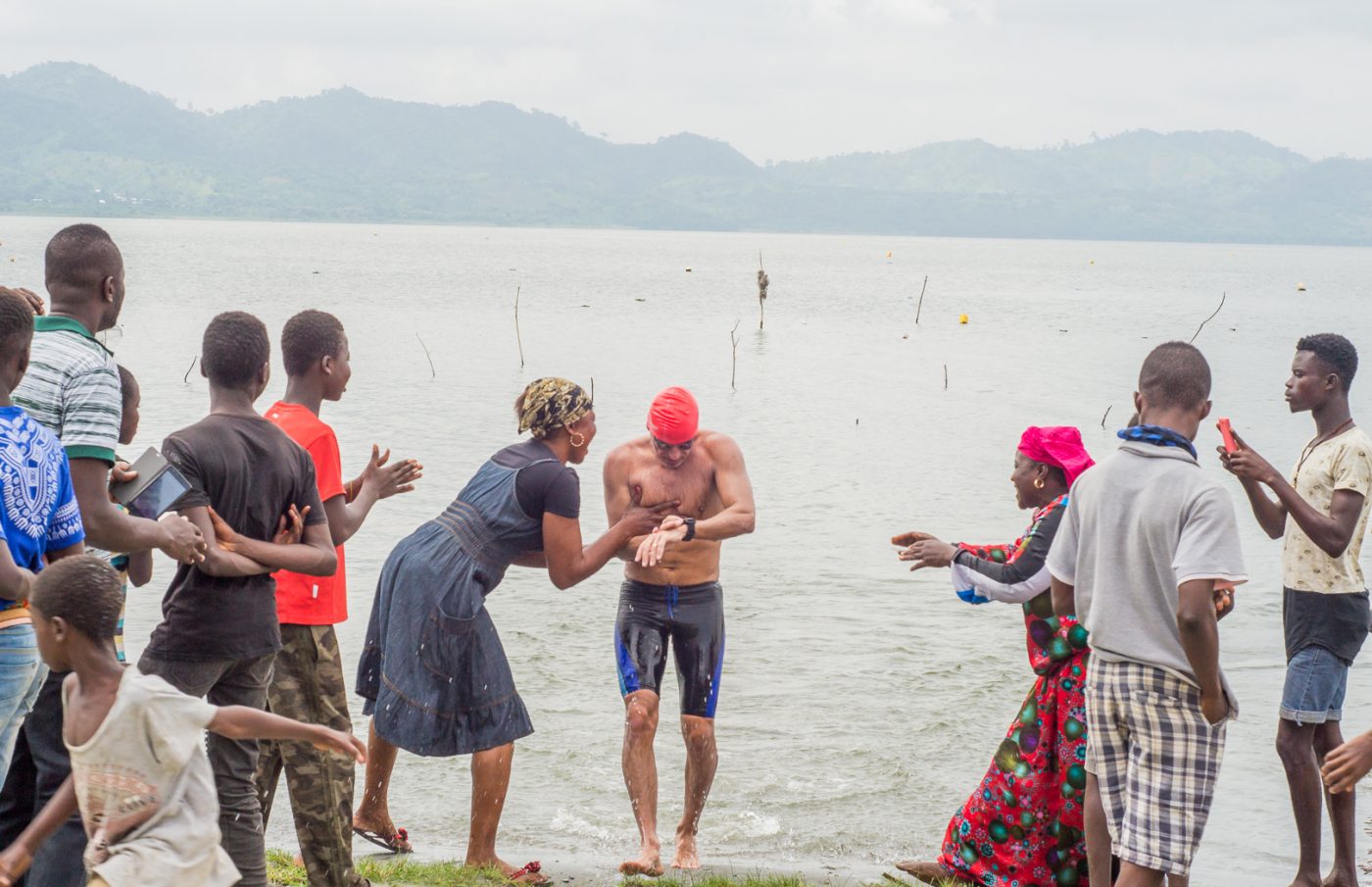 SWIMMING ACROSS LAKE BOSOMTWE